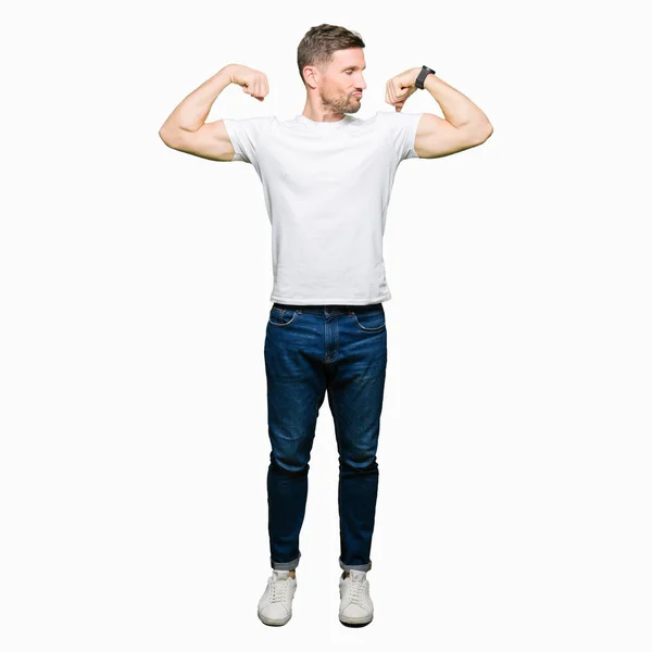 Handsome Man Wearing Casual White Shirt Showing Arms Muscles Smiling — Stock Photo, Image