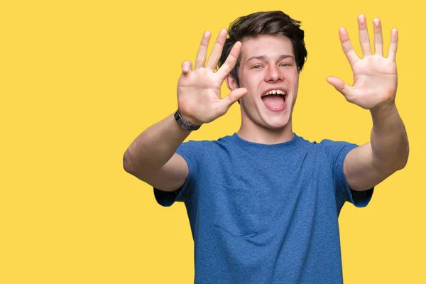 Jovem Homem Bonito Vestindo Camiseta Azul Sobre Fundo Isolado Mostrando — Fotografia de Stock