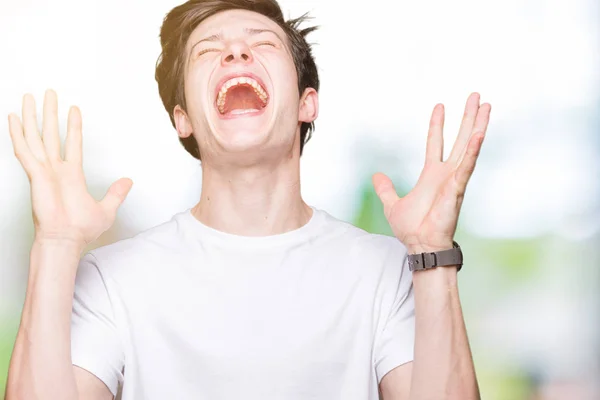 Homem Bonito Jovem Vestindo Casual Shirt Branca Sobre Fundo Isolado — Fotografia de Stock