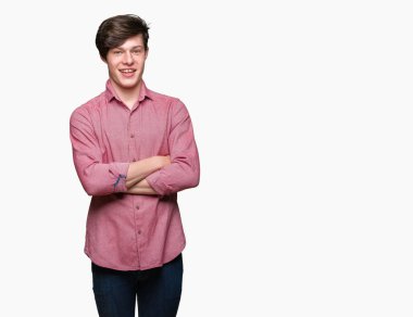 Kameraya bakarak çapraz silah ile gülümseyen izole arka plan mutlu yüzüne genç yakışıklı iş adamı. Olumlu bir kişi.