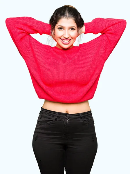 Young Beautiful Woman Wearing Red Sweater Bun Relaxing Stretching Arms — Stock Photo, Image