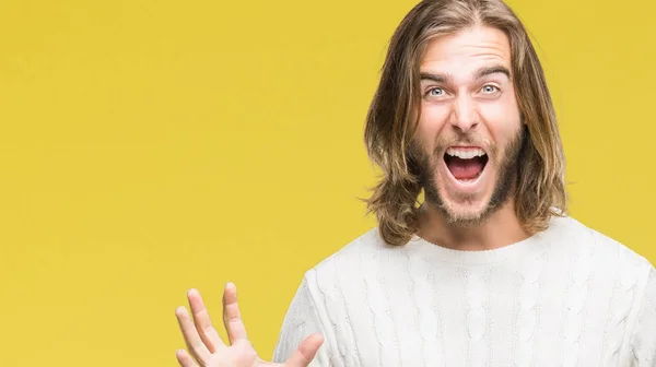 Junger Gutaussehender Mann Mit Langen Haaren Winterpullover Über Isoliertem Hintergrund — Stockfoto