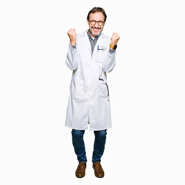 Middle Age Doctor Men Wearing Medical Coat Celebrating Surprised Amazed — Stock Photo, Image