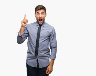 Genç yakışıklı iş adamı ile başarılı fikir parmağı yukarıyı izole arka plan üzerinde. Çıktıktan ve mutlu. Bir numara.