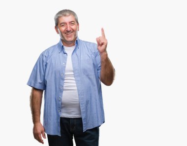 Başarılı fikirle parmağı yukarıyı izole arka plan üzerinde yakışıklı komuta sizde. Çıktıktan ve mutlu. Bir numara.