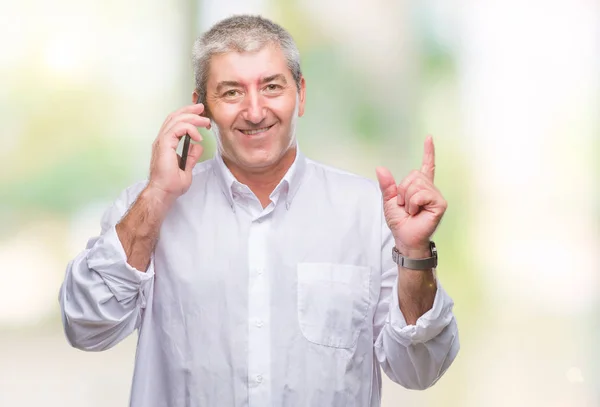 Handsome Senior Man Talking Smartphone Isolated Background Very Happy Pointing — Stock Photo, Image