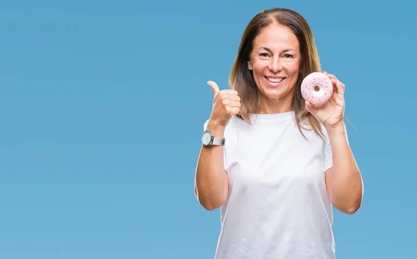 Middle Age Hispanic Woman Eating Pink Donut Isolated Background Pointing — Stock Photo, Image