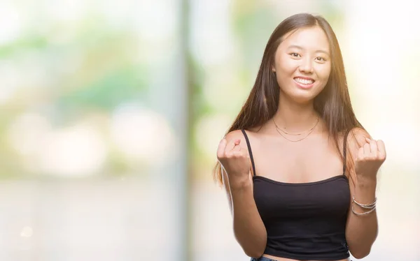 Young Asian Woman Isolated Background Celebrating Surprised Amazed Success Arms — Stock Photo, Image