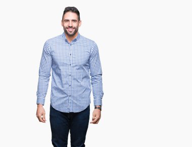 Yakışıklı delikanlı yüzünde mutlu ve güzel bir gülümseme ile izole arka plan üzerinde. Şanslı kişi.