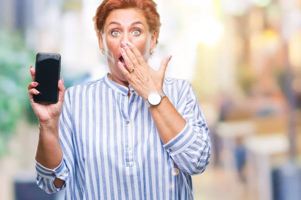 Atrractive Senior Caucasian Redhead Woman Showing Smartphone Screen Isolated Background — Stock Photo, Image