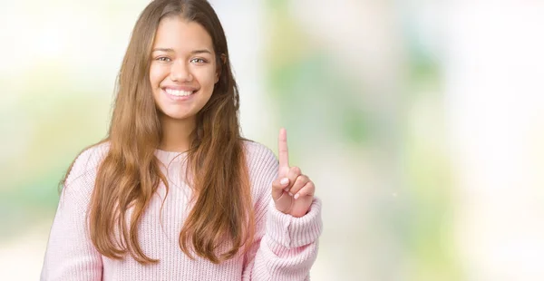 Junge Schöne Brünette Frau Trägt Rosa Winterpullover Über Isoliertem Hintergrund — Stockfoto