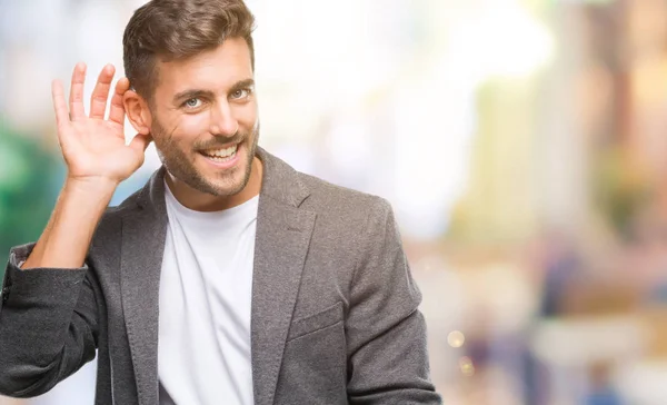 Jovem Homem Negócios Bonito Sobre Fundo Isolado Sorrindo Com Mão — Fotografia de Stock