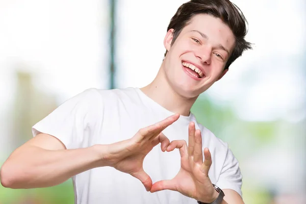 Homem Bonito Jovem Vestindo Casual Shirt Branca Sobre Fundo Isolado — Fotografia de Stock