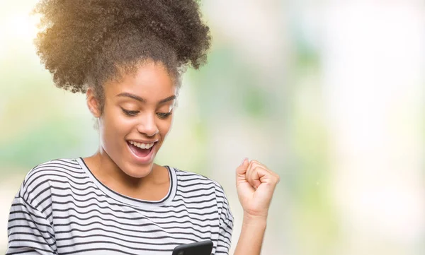 Young Afro American Woman Texting Using Smartphone Isolated Background Screaming — Stock Photo, Image