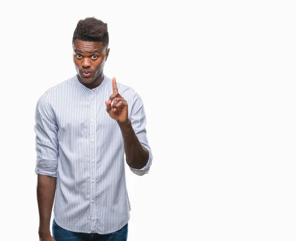 Joven Afroamericano Sobre Fondo Aislado Mostrando Señalando Con Dedo Número — Foto de Stock