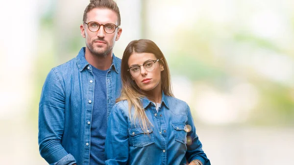 Pareja Joven Enamorada Usando Gafas Sobre Fondo Aislado Con Expresión — Foto de Stock