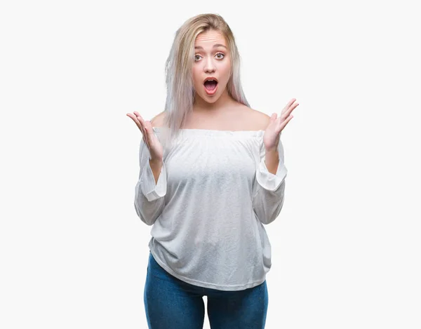 Jonge Blonde Vrouw Geïsoleerde Achtergrond Bang Geschokt Met Verrassing Expressie — Stockfoto