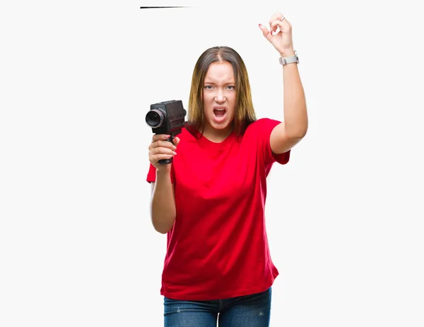 Young Beautiful Caucasian Woman Filming Using Vintage Video Camera Isolated — Stock Photo, Image