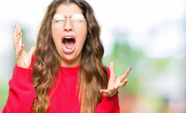 Young Beautiful Woman Wearing Red Glasses Crazy Mad Shouting Yelling — Stock Photo, Image