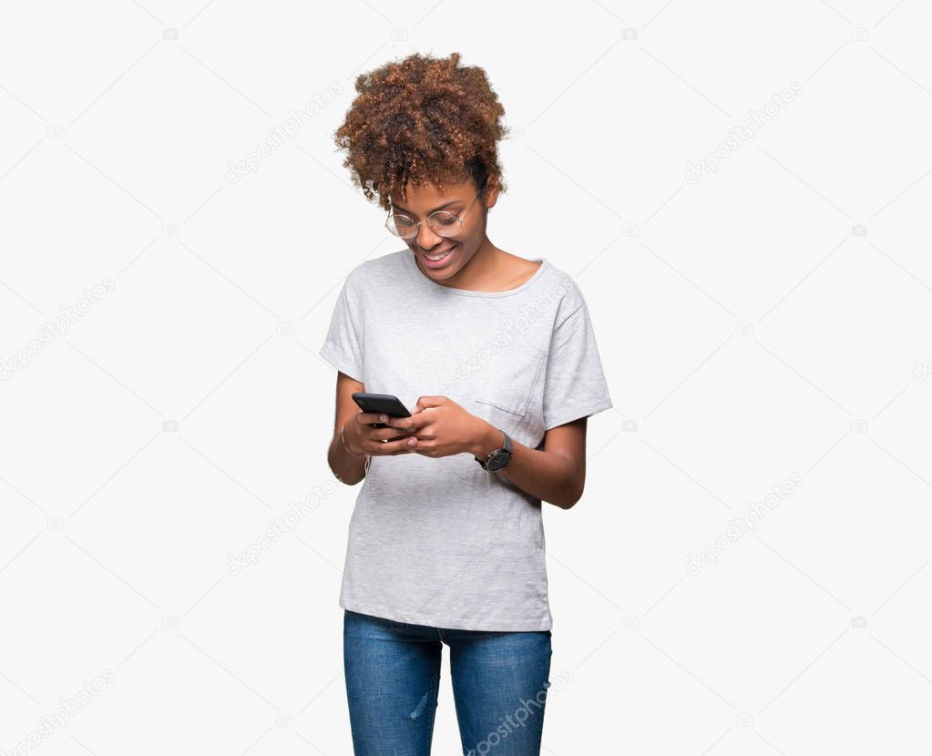 Young african american woman using smartphone over isolated background with a happy face standing and smiling with a confident smile showing teeth