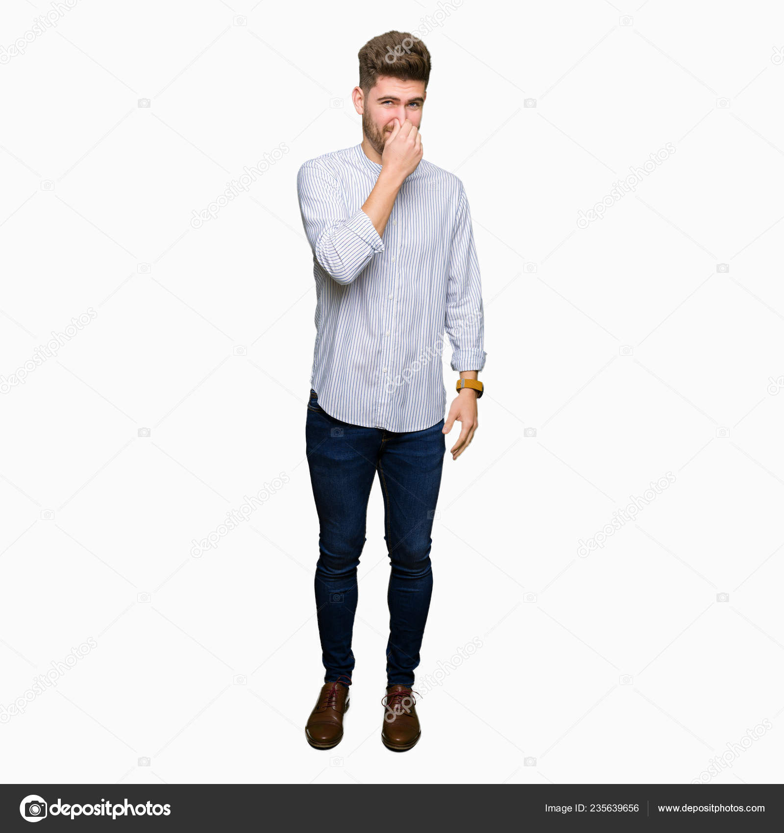 Young Handsome Man Smelling Something Stinky Disgusting Intolerable Smell  Holding — Stock Photo © Krakenimages.com #235639656, image size:1600x1700