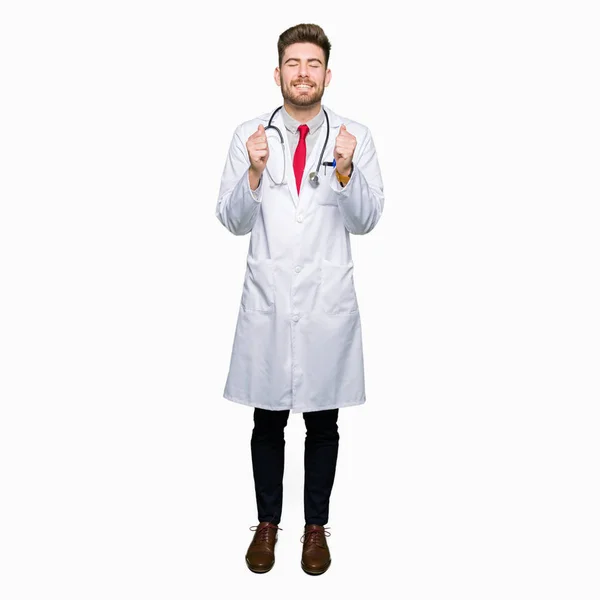 Young Handsome Doctor Man Wearing Medical Coat Excited Success Arms — Stock Photo, Image
