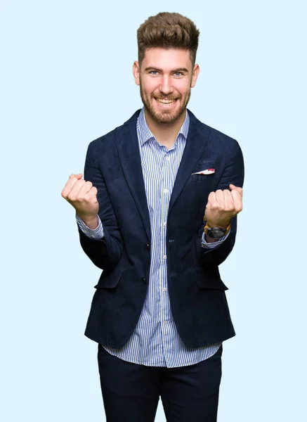 Young Handsome Bussines Man Celebrating Surprised Amazed Success Arms Raised — Stock Photo, Image