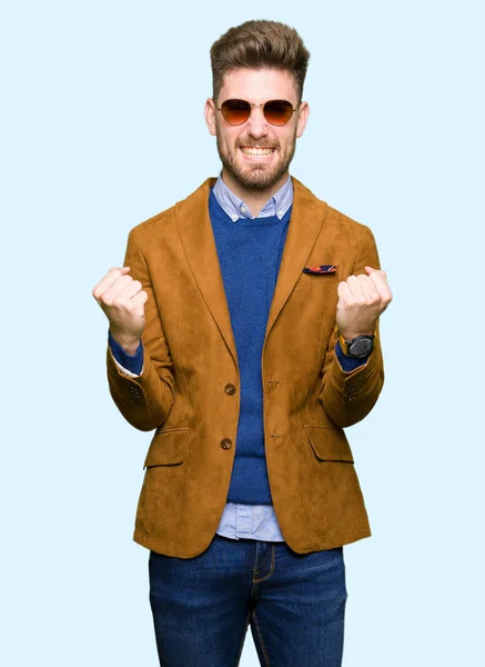 Young Handsome Elegant Man Wearing Sunglasses Celebrating Surprised Amazed Success — Stock Photo, Image