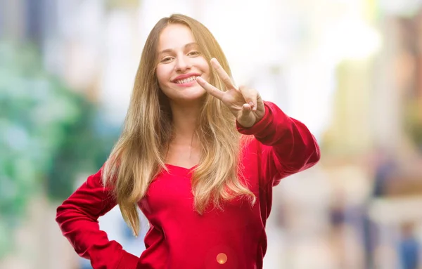 Jovem Mulher Loira Bonita Vestindo Camisola Vermelha Sobre Fundo Isolado — Fotografia de Stock