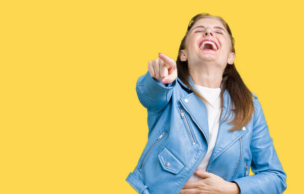 Beautiful middle age mature woman wearing fashion leather jacket over isolated background Laughing of you, pointing to the camera with finger hand over chest, shame expression
