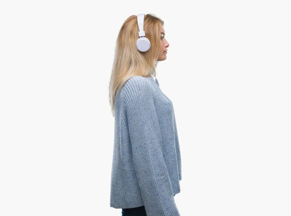 Young Caucasian Woman Listening Music Wearing Headphones Isolated Background Looking — Stock Photo, Image