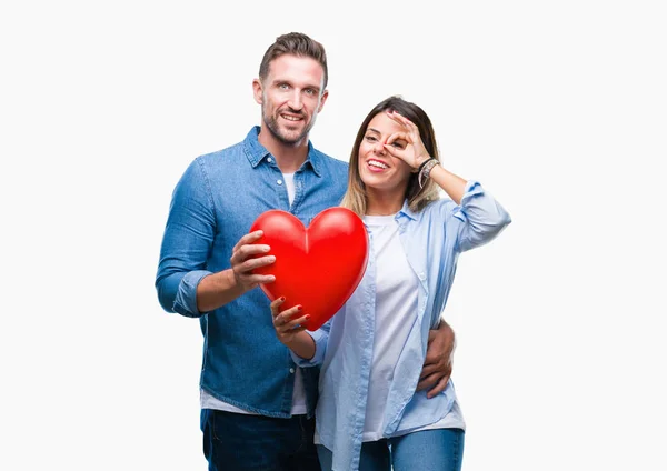 Junges Verliebtes Paar Hält Rotes Herz Über Isoliertem Hintergrund Mit — Stockfoto