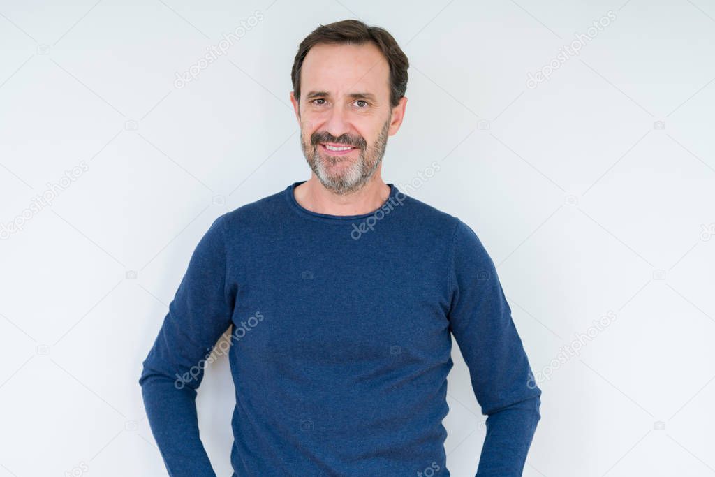 Elegant senior man over isolated background Relaxed with serious expression on face. Simple and natural looking at the camera.