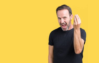 Yakışıklı orta yaş ağarmış komuta sizde izole arka yapıyor İtalyan üzerinde el ve parmak emin ifadeyle jest