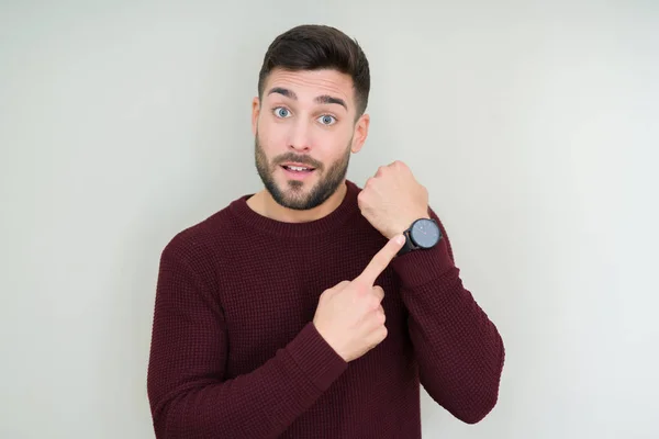 Jovem Bonitão Vestindo Uma Camisola Sobre Fundo Isolado Com Pressa — Fotografia de Stock