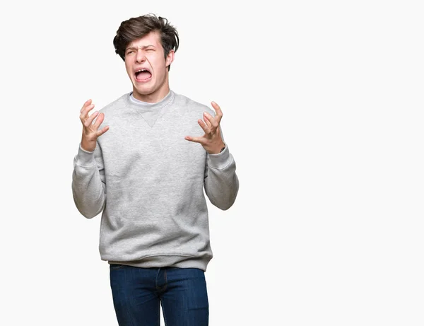 Joven Hombre Deportivo Guapo Con Sudadera Sobre Fondo Aislado Loco —  Fotos de Stock