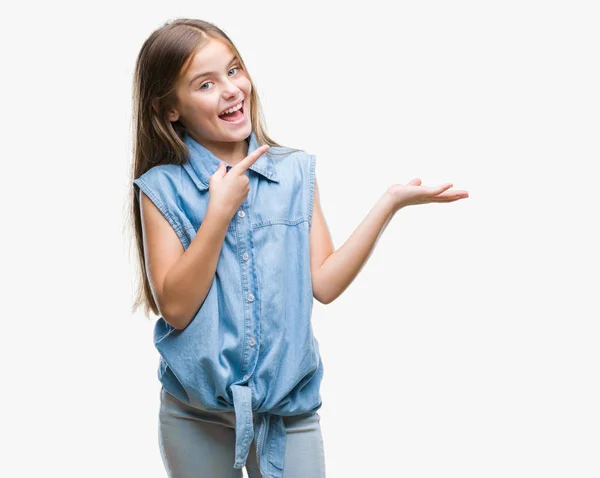 Young Beautiful Girl Isolated Background Amazed Smiling Camera While Presenting — Stock Photo, Image