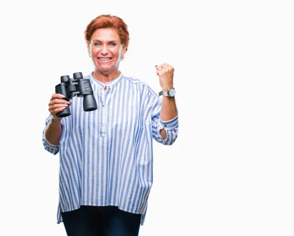 Senior Caucasian Woman Looking Binoculars Isolated Background Screaming Proud Celebrating — Stock Photo, Image