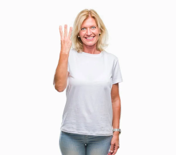 孤立した背景表示と指で上向きに中年の金髪女性番号自信を持って 幸せな笑みを浮かべている間 — ストック写真