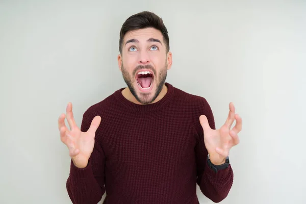 Homem Bonito Jovem Vestindo Uma Camisola Sobre Fundo Isolado Louco — Fotografia de Stock