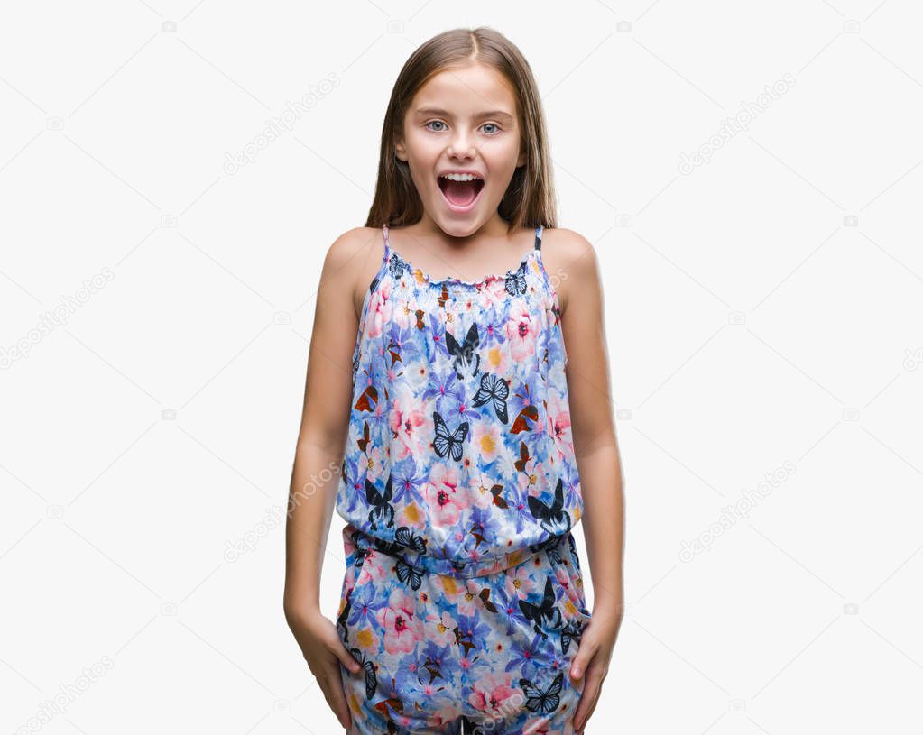 Young beautiful girl wearing colorful dress over isolated background afraid and shocked with surprise expression, fear and excited face.