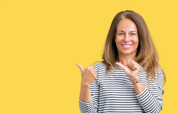 Beautiful Middle Age Woman Wearing Stripes Sweater Isolated Background Pointing — Stock Photo, Image