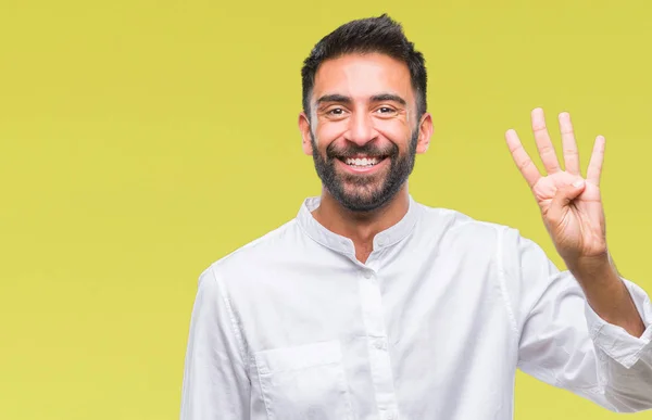成年西班牙裔男子在孤立的背景显示和指向手指数四 而微笑着自信和快乐 — 图库照片