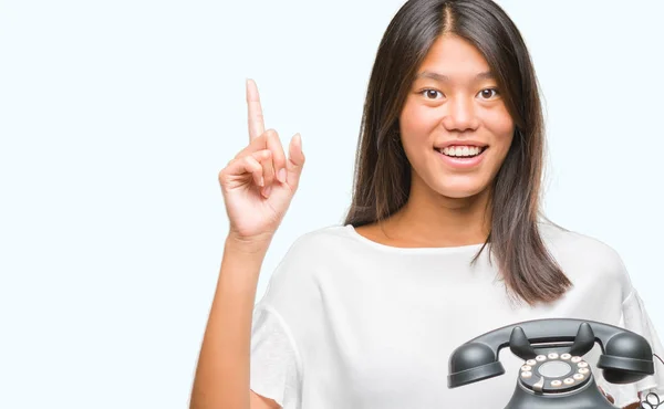 Young Asian Woman Holding Vintagera Telephone Isolated Background Surprised Idea — Stock Photo, Image