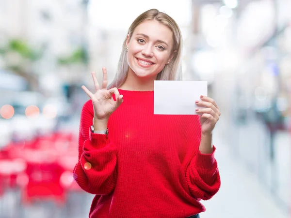 Unga Blonda Kvinnan Hålla Blankt Papperskort Över Isolerade Bakgrund Gör — Stockfoto