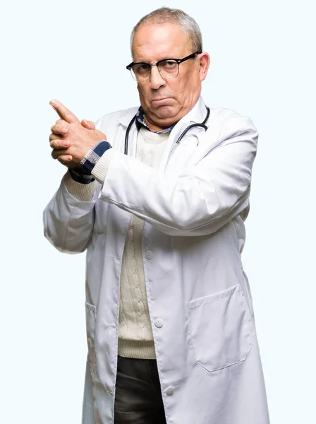 Handsome Senior Doctor Man Wearing Medical Coat Holding Symbolic Gun — Stock Photo, Image