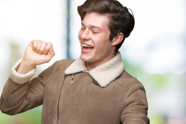 Joven Hombre Guapo Con Abrigo Invierno Sobre Fondo Aislado Bailando — Foto de Stock