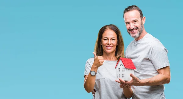Hispanische Paar Mittleren Alters Beiläufigen Kauf Eines Neuen Hauses Über — Stockfoto