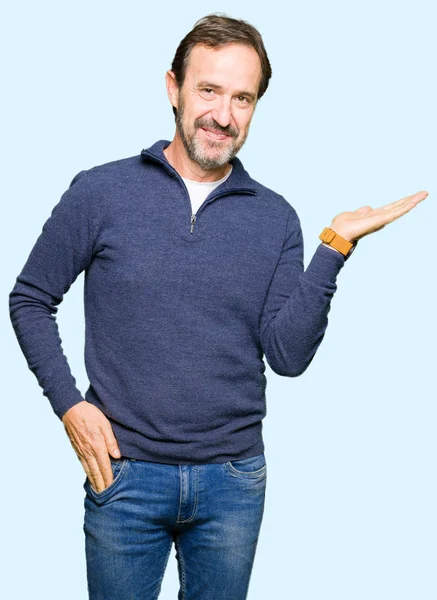 Middle Age Handsome Man Wearing Sweater Smiling Cheerful Presenting Pointing — Stock Photo, Image