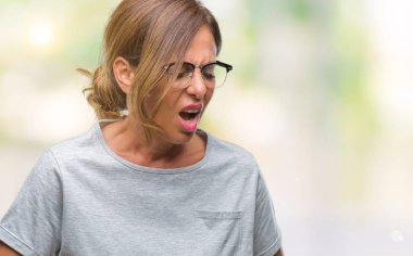 Üzerinde gözlük takan orta yaş İspanyol kadın kıdemli izole mide üzerinde el ile arka plan çünkü mide bulantısı, ağrılı hastalık hasta hissediyor. Ağrısı kavramı.